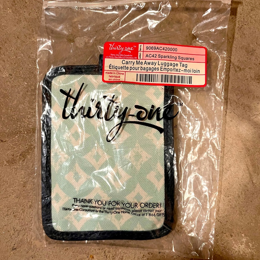Thirty one luggage tag